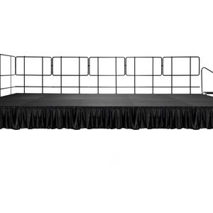 May include: Black stage with a black fabric skirt and a black metal railing around the perimeter.