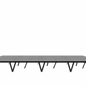 May include: A black stage platform with multiple adjustable legs. The platform is made of a sturdy material and is designed for use in a variety of settings.