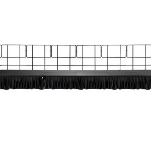 May include: A black stage with a black fabric skirt and a black metal railing around the perimeter.