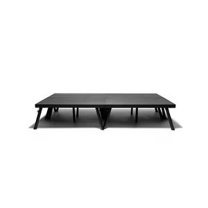 May include: Black stage platform with multiple sections and adjustable legs.