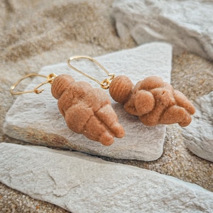 Natural Venus of Willendorf earrings, gold surgical steel and polymer clay, imitating real stone but incredibly lightweight
