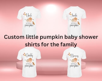 May include: White t-shirts with pumpkin-themed designs for a baby shower. The shirts feature text like "Uncle," "Auntie," "Daddy," and "Mommy" with pumpkin illustrations and the phrase "Little Pumpkin." The text "Custom little pumpkin baby shower shirts for the family" is also displayed.