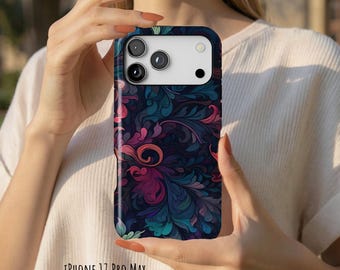 May include: A glossy phone case for an iPhone 17 Pro Max featuring a dark, intricate pattern of swirling, organic shapes in shades of deep blue, teal, magenta, and purple. The case has a white camera cutout area with three circular lenses.