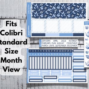 May include: Blue and white monthly planner stickers with a floral pattern and teacup illustrations. The stickers are designed to fit a standard Colibri size planner.