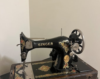 Singer model 128 kniekruknaaimachine uit 1924