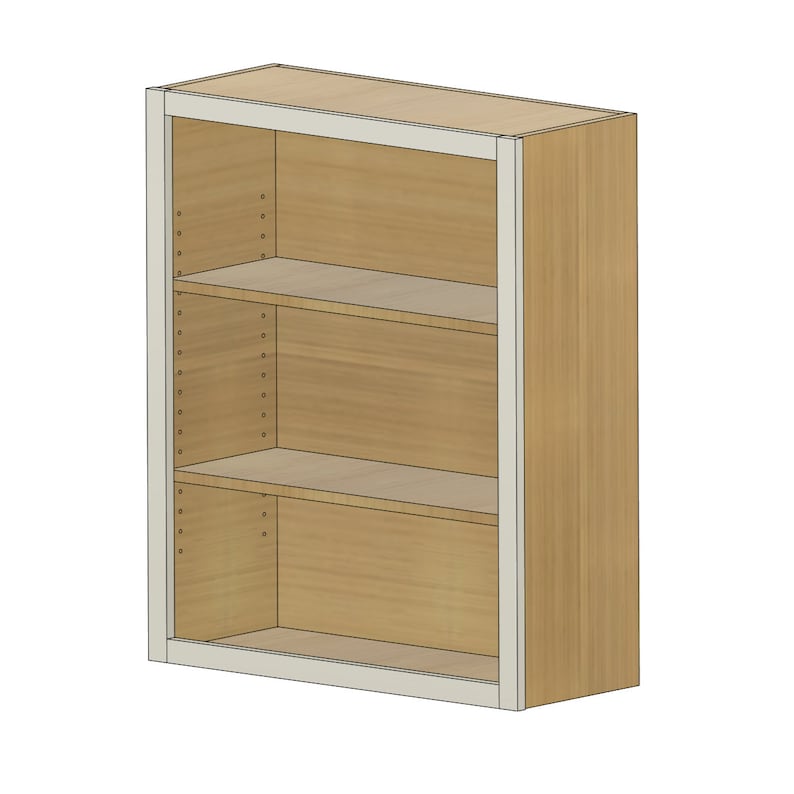 May include: A wooden bookcase with three shelves. The bookcase is light brown with a white trim. The shelves are empty.
