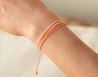 Pulsera ajustable, resistente al agua, de múltiples hebras, inspirada en el atardecer.