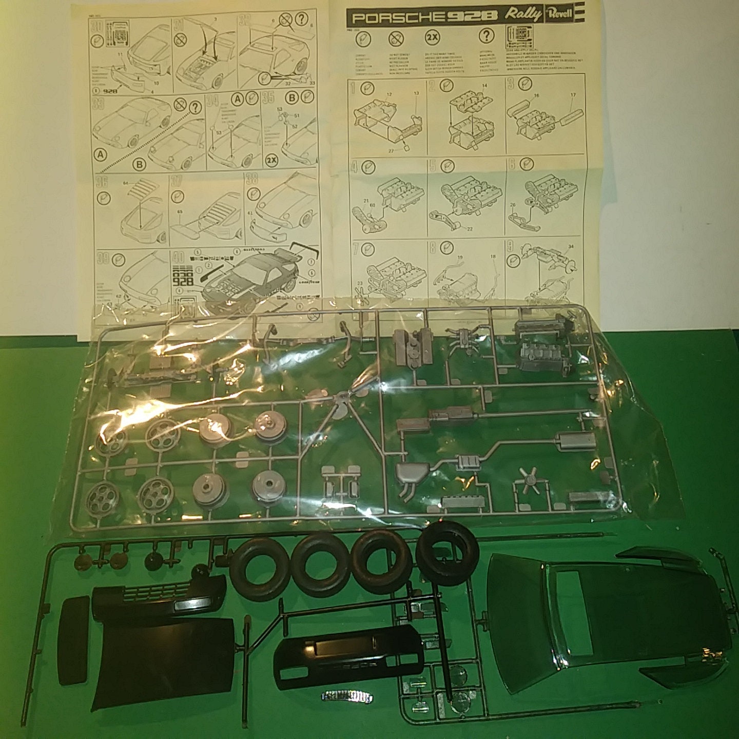 PORSCHE 928 RALLY 1980, Revell 1/16 Scale 11 Plastic Model Kit 7483,  Vintage New, Mint Condition in Original Bags but NO Box. 