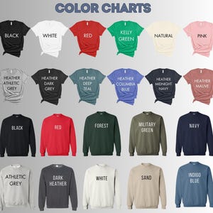 a bunch of different colored shirts on a white background