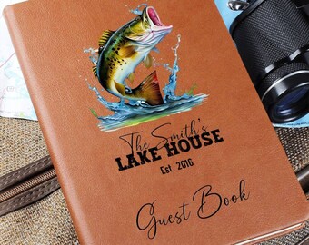 May include: A brown leather guest book featuring a bass leaping from the water. The cover text reads "The Smith's Lake House Est. 2016 Guest Book".