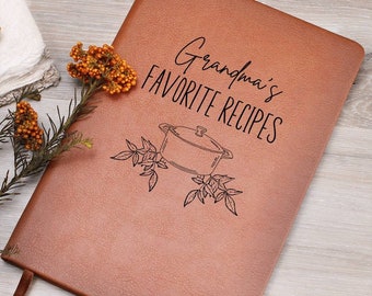 May include: A brown leather-bound recipe book with the text "Grandma's Favorite Recipes" and a drawing of a pot with leaves.