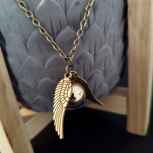 Bijoux Harry Potter : collier et boucles d'oreilles Vif d'Or sur  Logeekdesign