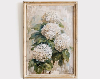 May include: A framed painting of white hydrangeas with green leaves on a textured background. The frame is a light wood color.