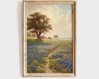Può includere: Un dipinto incorniciato di un paesaggio con un grande albero in primo piano, un sentiero sterrato che conduce attraverso un campo di fiori blu, e un cielo luminoso e soleggiato.