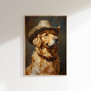 May include: A framed portrait of a Golden Retriever wearing a cowboy hat and a brown collar. The dog has light brown fur and is looking to the right. The background is a dark, textured blend of brown and blue.