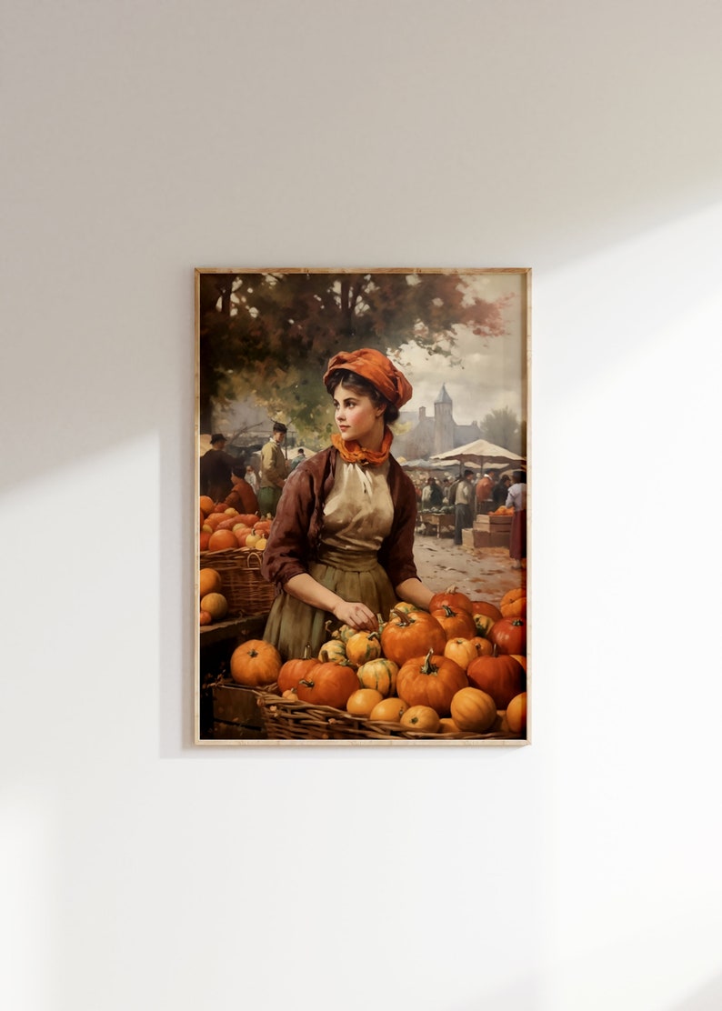 May include: A painting of a woman in a brown dress and orange hat selling pumpkins at a market. The woman is standing behind a table full of pumpkins, and there are other people in the background.