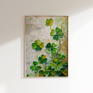 Puede incluir: Una pintura enmarcada de tr&eacute;boles de cuatro hojas verdes sobre un fondo blanco. Los tr&eacute;boles est&aacute;n pintados en un estilo texturizado, lo que le da a la pintura un aspecto tridimensional.