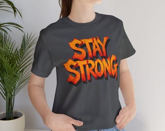 Stay Strong Graffiti T-Shirt: Edgy Slogan, Rebel Streetwear