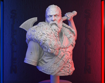 May include: A white 3D printed bust of a Viking warrior with a beard and a fur-lined cloak. He is holding an axe in his right hand. The bust is on a round base with a decorative design.