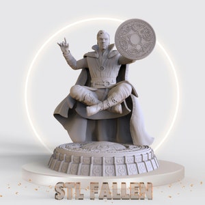May include: A 3D printed model of Doctor Strange, a fictional character from Marvel Comics, sitting in a meditative pose with a circular symbol in his hand. The model is printed in a light grey colour and is sitting on a circular base with intricate details. The base has the text "STL FALLEN" printed on it.