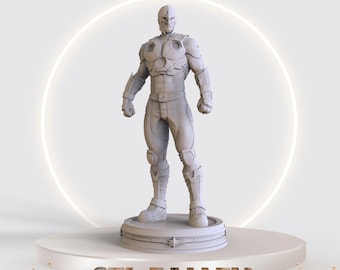Könnte beinhalten: Eine graue 3D-gedruckte Figur eines Superhelden, der auf einer runden Plattform steht, auf der der Text "STL FALLEN" darunter gedruckt ist. Die Figur trägt einen Helm und einen Anzug mit einem Stern auf der Brust.