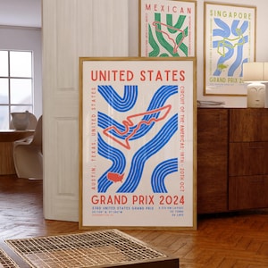 May include: A poster with a stylized illustration of the Circuit of the Americas racetrack in Austin, Texas. The poster is titled "United States Grand Prix 2024" and includes the date of the race, the length of the track, and the number of turns and laps. The poster is framed in wood.