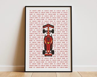 May include: A framed print featuring a Formula 1 race car in red and yellow, with the number 55. The background is filled with the text "CARLOS SAINZ 55" in red. The car is centered, showcasing its design.
