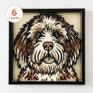 May include: A multi-layered wooden wall art piece featuring a brown and white dog with a black nose and tongue. The dog's fur is layered in shades of brown and white, creating a 3D effect.