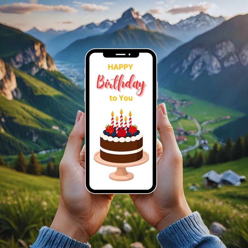 Birthday e-card shown on a smartphone in front of a scenic mountain valley. Ideal gift for someone traveling or enjoying nature.