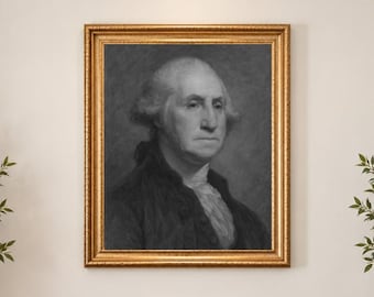 May include: A framed black and white portrait of George Washington in a gold-colored frame. The artwork depicts a side-profile view of the subject wearing a dark coat and a light-colored cravat, rendered in a charcoal or graphite drawing style.