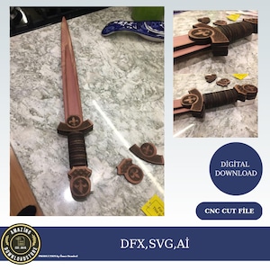 May include: A wooden sword with a fleur-de-lis design on the handle and blade. The sword is made of multiple pieces that are assembled together. The image also shows the individual pieces of the sword, which are ready to be cut out using a CNC machine. The image includes the text "DİGİTAL DOWNLOAD", "CNC CUT FİLE", and "DFX, SVG, Aİ".