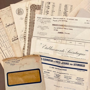 May include: A vintage envelope with a blue and white stamp that says "40". The envelope is addressed to "Monsieur MOREL Garage MAINBAT" and dated "12 F&eacute;vrier 1935".