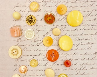 orange vintage buttons selection. 1950s orange and yellow plastic buttons in retro style. 20 different retro buttons. boho up cycled element