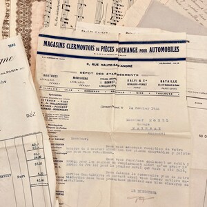 May include: A black and white document with the text "Magasins Clermontois de Pieces Dechange Pour Automobiles" and "9, Rue Haute-Saint-Andre". The document is dated "12 Fevrier 1935" and includes the name "Monsieur Horsl Garage Hainbat".