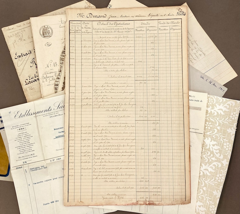May include: A vintage ledger page with handwritten entries in French. The page is titled "Detail des Operations" and includes columns for date, description, and amounts. The ledger is dated "Site le 11 Nov 1961".
