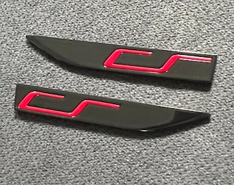 Juego de emblemas laterales VW Golf 7 Clubsport, logotipo en negro piano/rojo tornado.