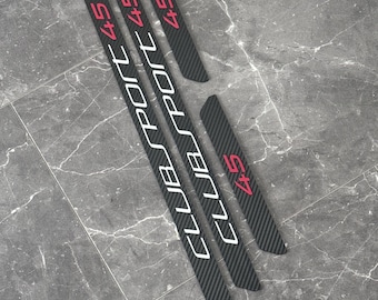 Golf 8 GTI Clubsport door sill trims in carbon look, adapted for plastic recesses with Clubsport 45 lettering in Pure White / Red