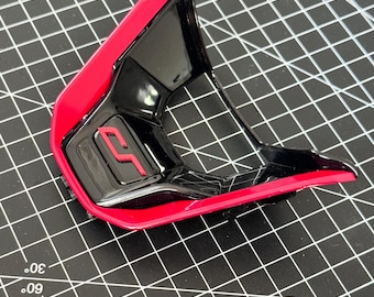 VW Golf 8 / 8.5 steering wheel trim. Original VW trim modified by us and fitted with a CS logo.