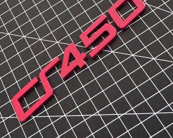 VW Golf GTI CLUBSPORT 45 emblem, logo, and lettering in a new self-adhesive design. Tornado red.