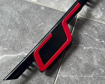 VW Golf 8 GTI Clubsport grille emblem in Tornado Red. Not suitable for facelift models.