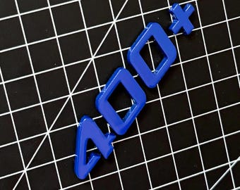 400+ lettering, logo, emblem painted in ultramarine blue