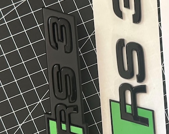 Audi RS3 (from 2019) logo set front and rear black / Kyarami green.