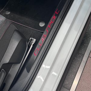 Golf 8 GTI Clubsport door sills in carbon look, adapted for plastic recesses with Clubsport lettering