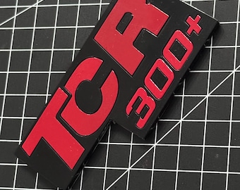 Emblema de la parrilla del radiador, logotipo TCR 300+
