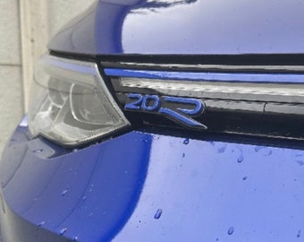 VW Golf 8 R 20 Years Edition radiator grille emblem ultramarine blue. Only available from us. Modified VW original part.