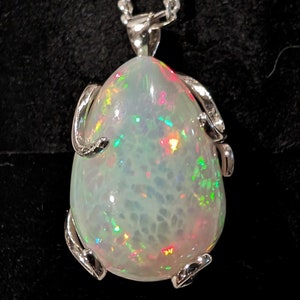 Collector grade 18.5 CT Welo Opal Pendant set in Sterling Silver