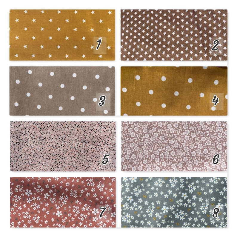 Puede incluir: Una colecci&oacute;n de ocho muestras de tela con varios patrones. Los patrones incluyen estrellas blancas sobre fondos amarillo mostaza y marr&oacute;n, lunares blancos sobre marr&oacute;n y amarillo mostaza, un dise&ntilde;o moteado rosa, patrones florales en rosa y gris, y patrones florales en rojo y azul.