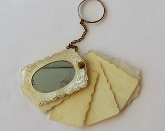 Antique dance card notebook with finger ring, mother-of-pearl celluloid