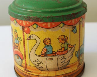 Antique jingle tin rotating rattle music box tin toy hand crank mechanical carousel children