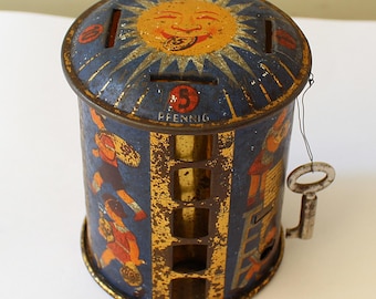 Antique money box tin toy penny playing children 1930s